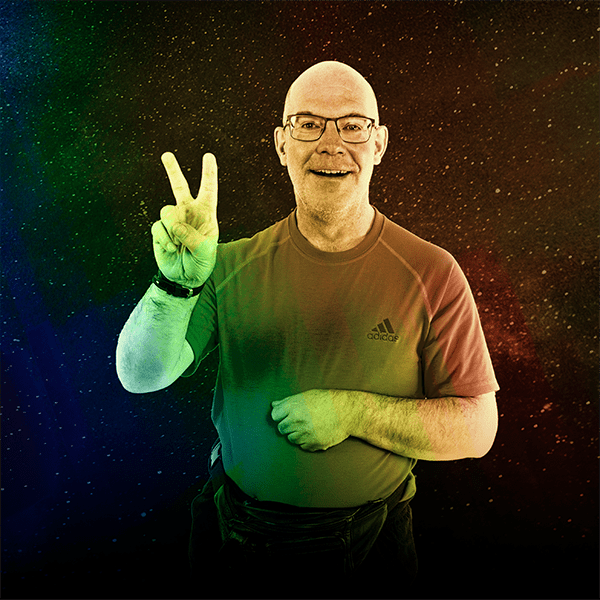 Early Fifties ensemble member, Tony Goodison, giving a peace-sign gesture to the camera, posed against a star background. Image is treated with rainbow overlay to match the album artwork. Tony is light-skinned, with buzzed hair, and wearing an Adidas shirt and black fanny-pack.